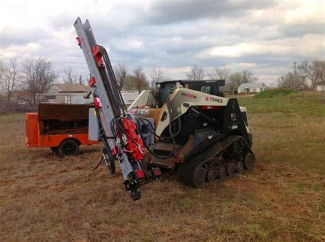 hydraulic rock drill for skid steer|word rock skid steer attachment.